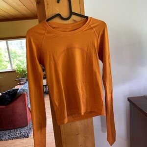 Lululemon swiftly tech long sleeve. Hip length